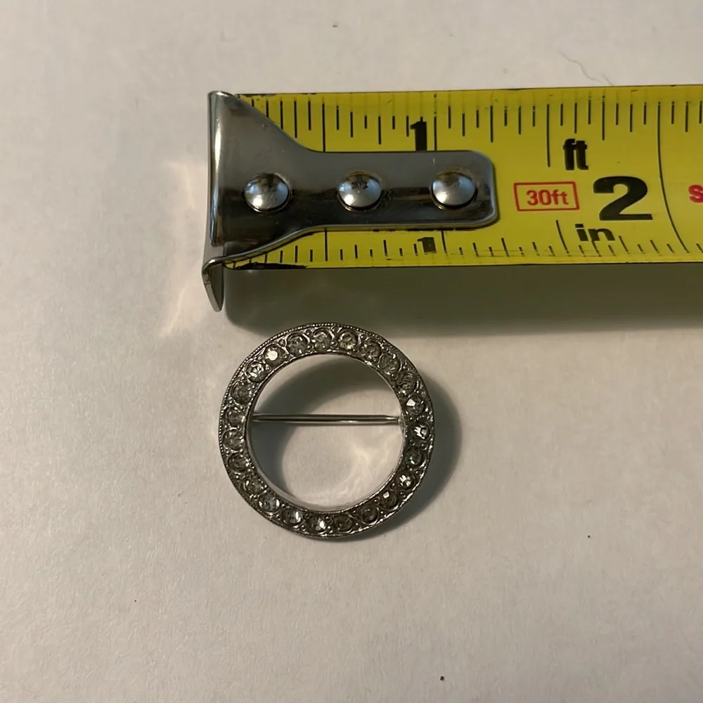 Vintage silver round rhinestone brooch